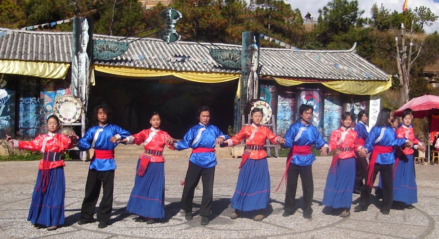 Folk Dancers in traditional dress at Dongba Cultural Village