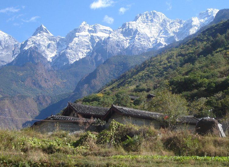 Peaks of Jade Dragon Snow Mountain ( Yulong Xueshan ) from Yangtse River Valley