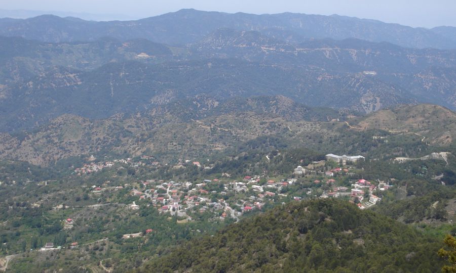 Mount Tripylos and hill village from the Artemis Trail on Mount Olympus