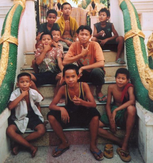 Lao Boys at a Wat ( Buddhist Temple ) in Vientiane - capital city of Laos