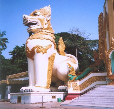 Giant Dragon Dog ( Chinthe ) at Western Entrance to Shwedagon Paya in Yangon ( Rangoon ) in Myanmar ( Burma )