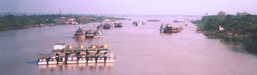 Boats in Yangon River in Yangon ( Rangoon ) in Myanmar ( Burma )