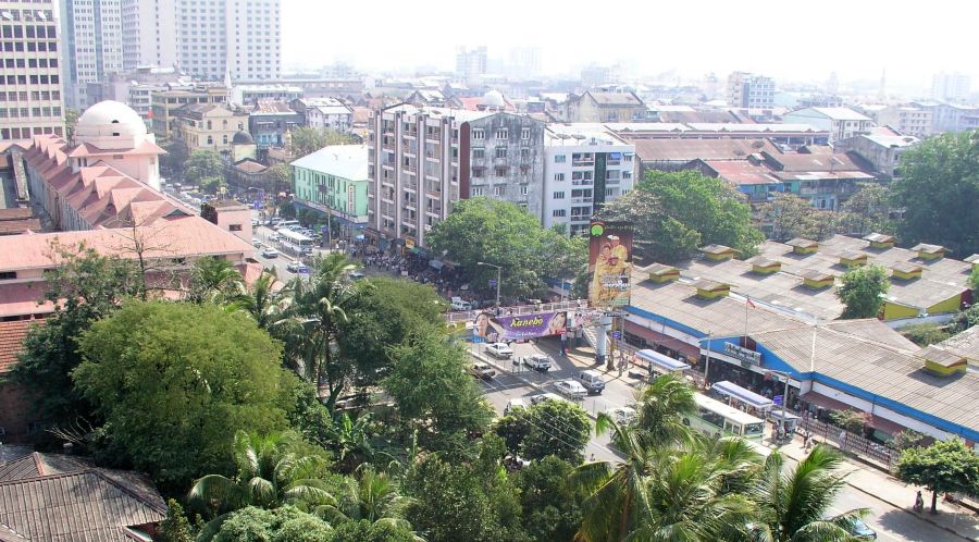 Road Traffic in central Yangon ( Rangoon ) in Myanmar ( Burma )