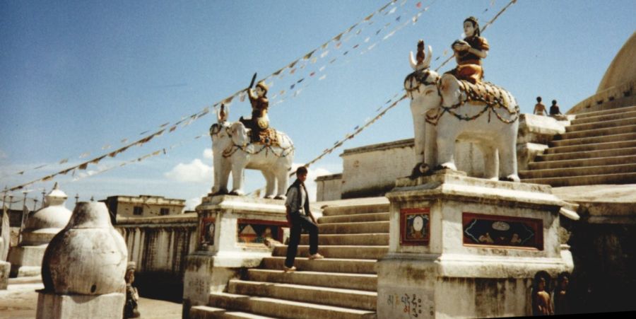 Guardians on Temple Steps on Buddhist Stupa at Bodnath ( Baudhanath ) in Kathmandu