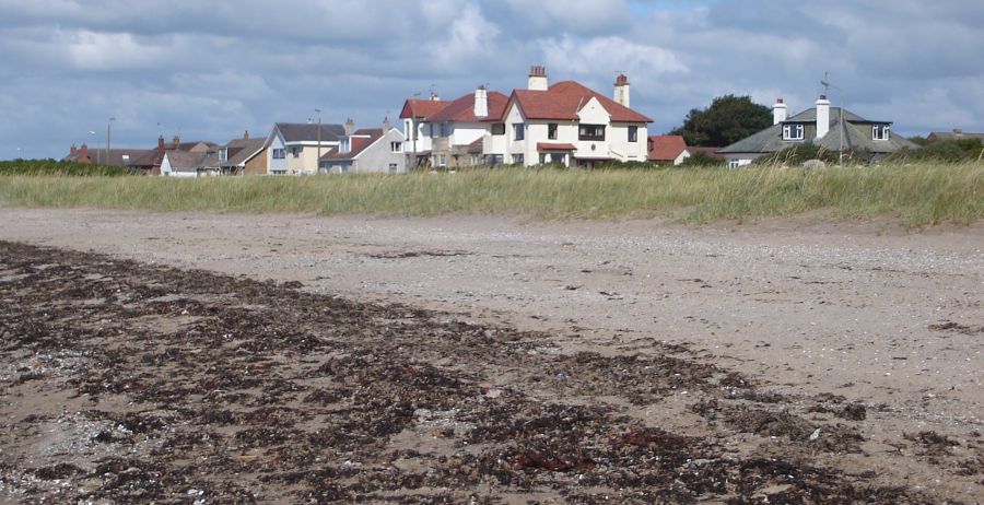 Houses at Barassie from beach on the Ayrshire Coastal Path from Troon to Irvine