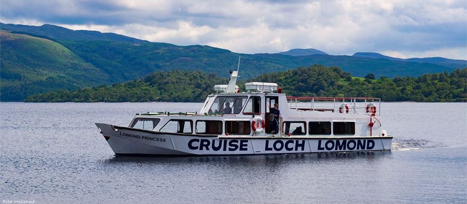 Cruise boat on Loch Lomond at Luss Village
