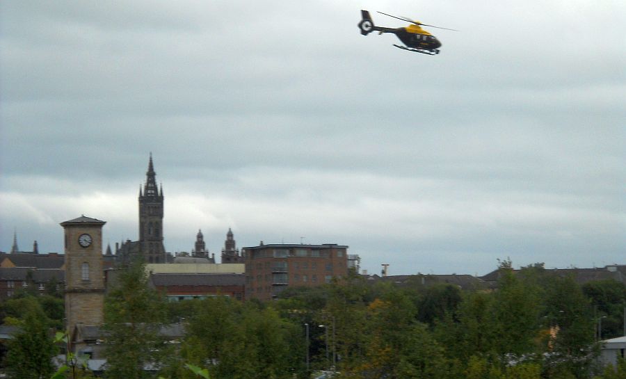 Helicopter from heliport above Glasgow