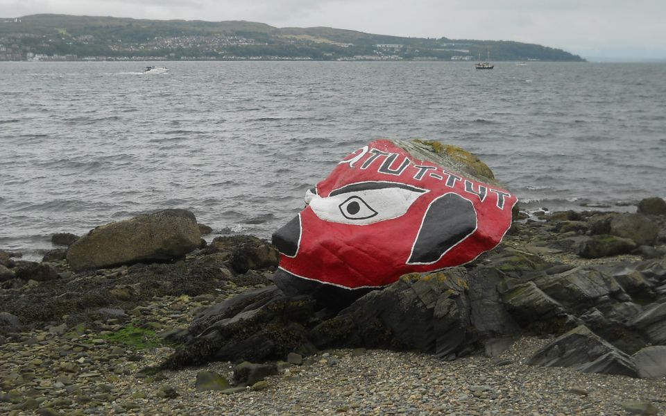 Painted rock on the shore at Kilcreggan