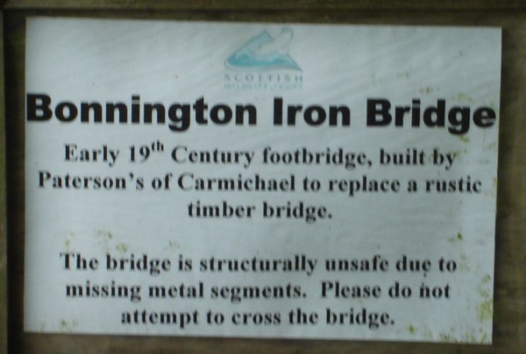 Sign at the Bonnington Iron Bridge on the path to the Falls