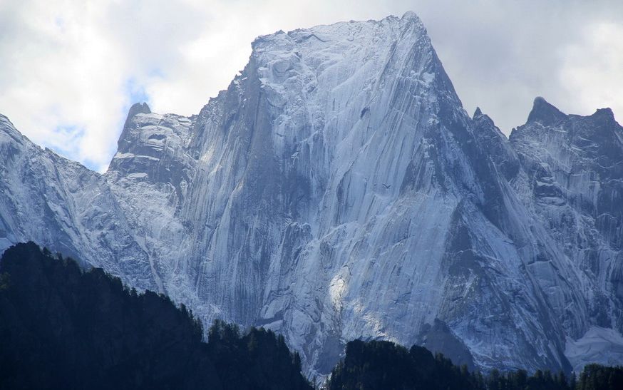 The north-east face of Piz Badile ( 3308m, 10,853ft ) in SE Switzerland