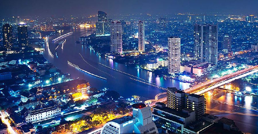 Illuminations at night on Chao Phraya River in Bangkok