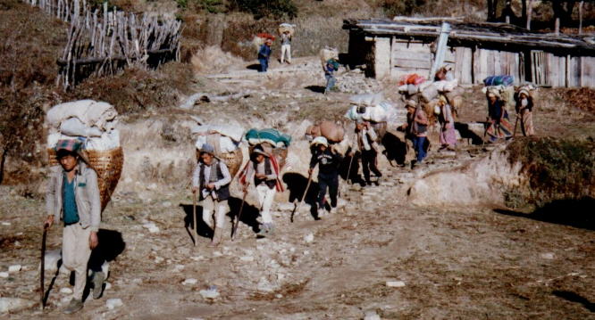 Train of professional porters carrying goods to Namche Bazaar